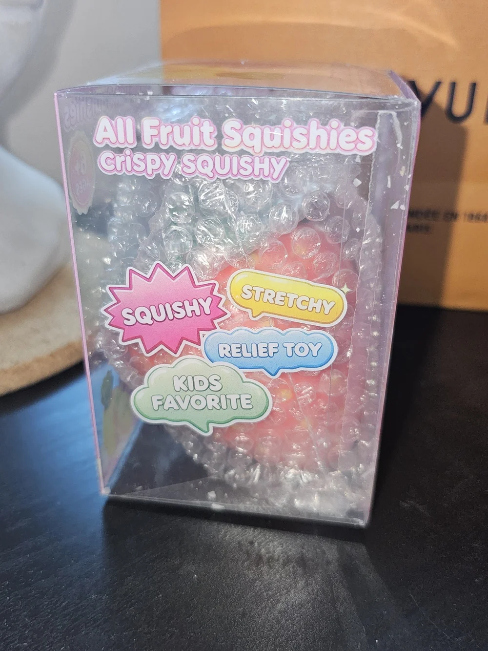 New in Package. Crispy Squishy Fruit Stress Toy - Strawberry